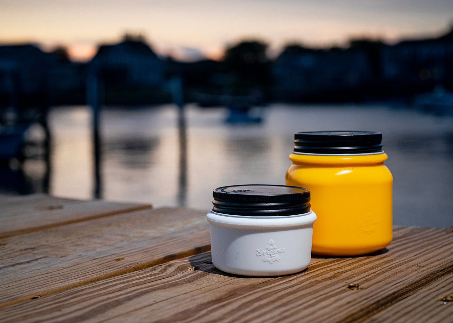 White ESS Mini and yellow ESS shown on dock