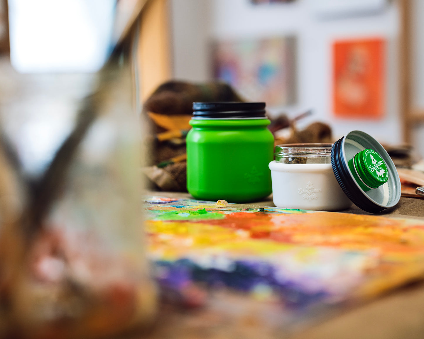 Lime green ESS and white ESS Mini in painter's studio