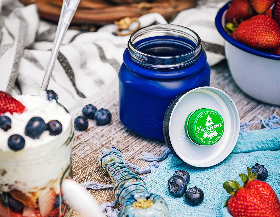 Evergreen Storage Solution jar open on dessert table showing pod