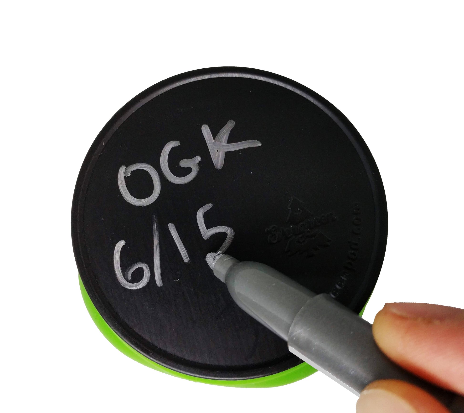 Marker writing on Evergreen jar lid 